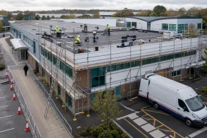 Commercial roof works with safe access routes kept clear.